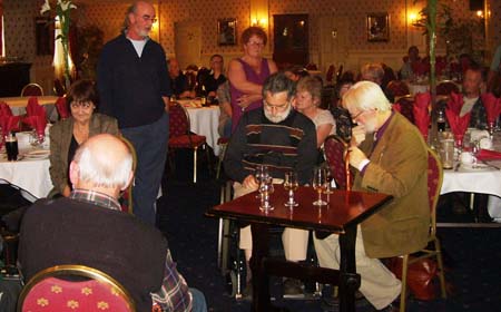 Image of Greg OHanlon and Tom Munnelly listen to Gerry Cullen sing